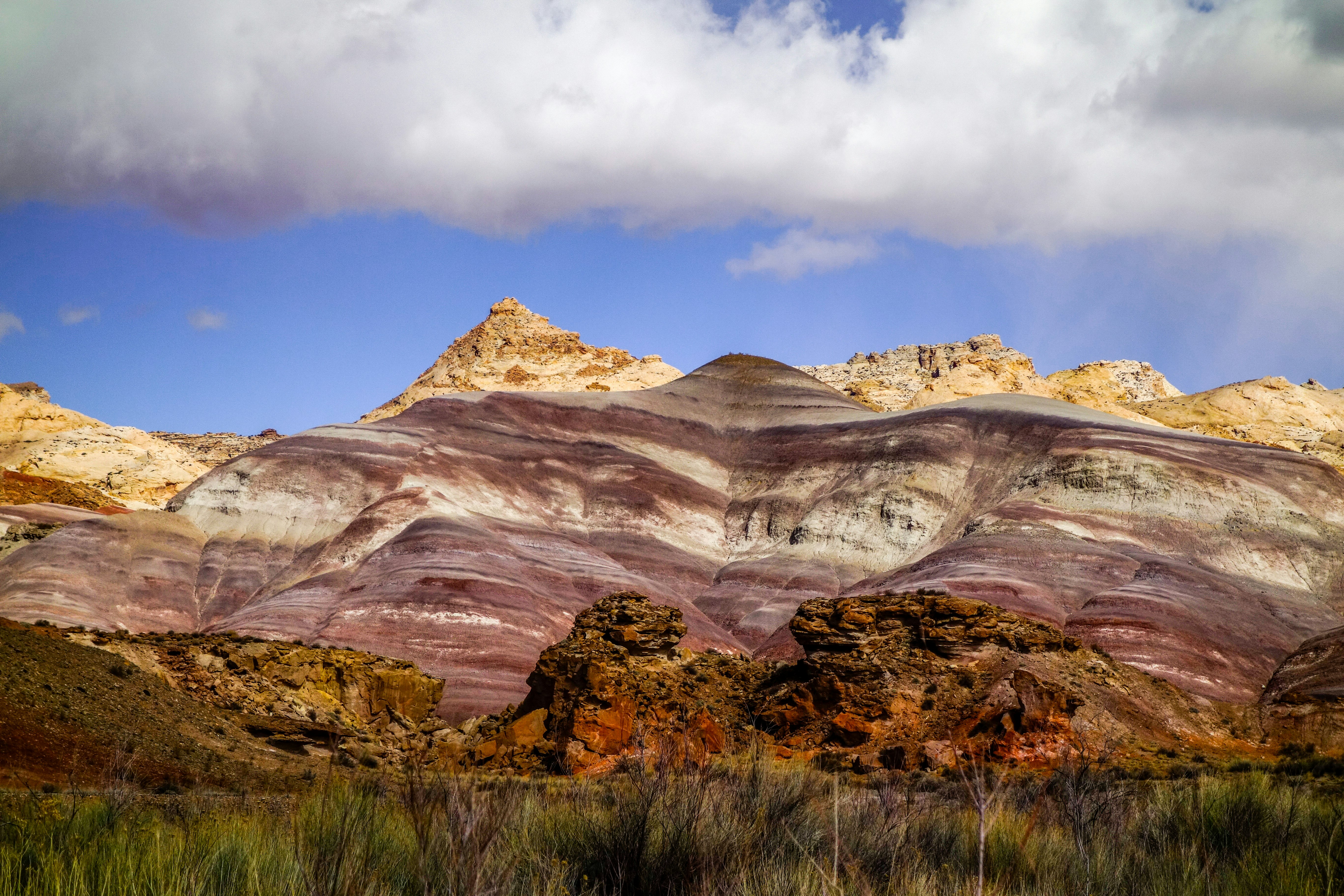 brown rocky mountain under blue sky during daytime